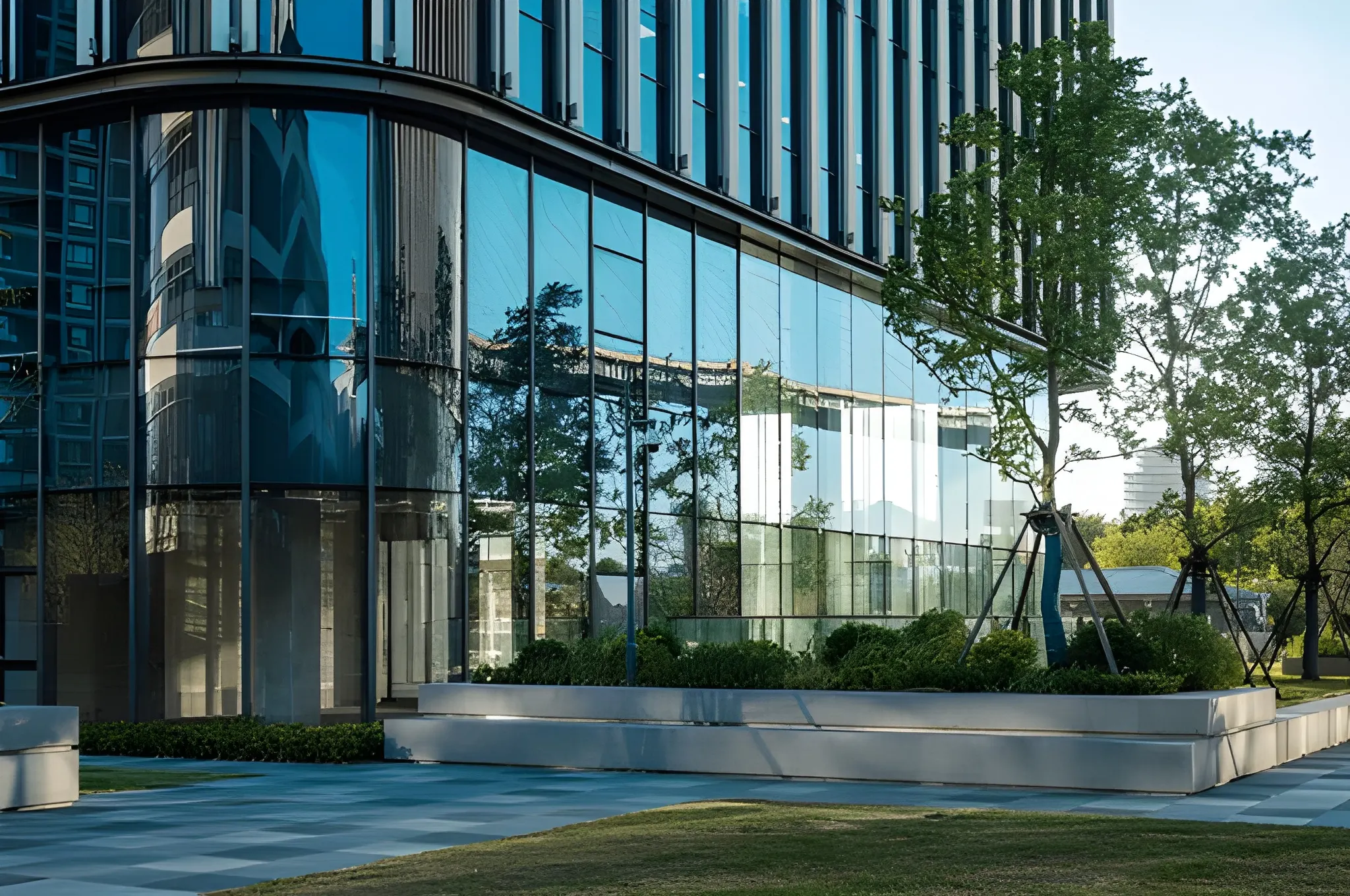 Modern glass curtain wall facade by Jindal Apex Facade